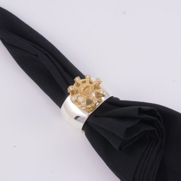 Isabella Adams Gold Crown Napkin Ring pictured with napkin