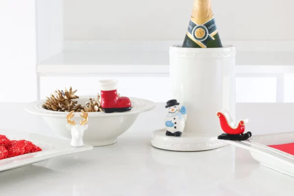 Nora Fleming Mini Frosty snowman and other holiday minis attached to various trays