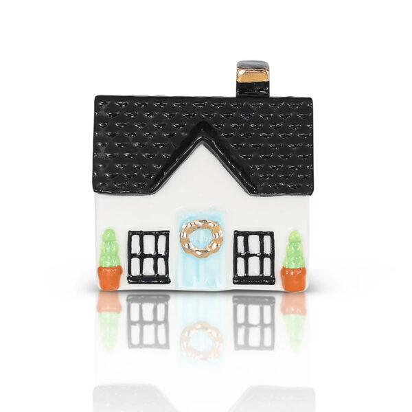 Nora Fleming Mini Home Sweet Home house with black roof, two windows, and a blue front door