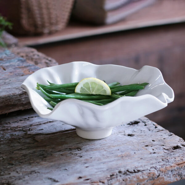 Bloom Small White Bowl filled with green beans and a lemon slice